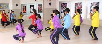 Students learning music at Indian Public School